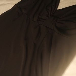 Short V-neck black dress. Worn once